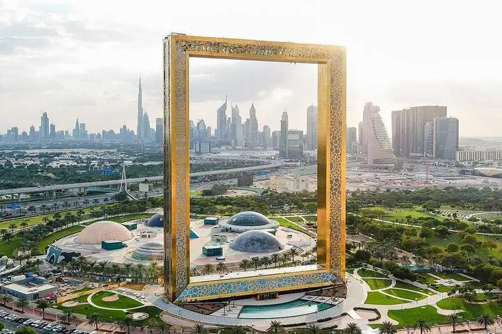Experience the unique fusion of tradition and modernity at the Dubai Frame where breathtaking views of the city’s skyline intersect with lush green landscapes setting the stage for memorable exploration.